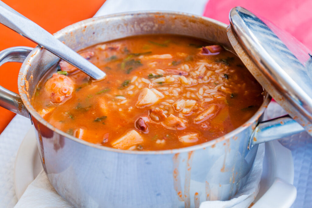 a pot full of Arroz de Polvo, one of the best rice dishes