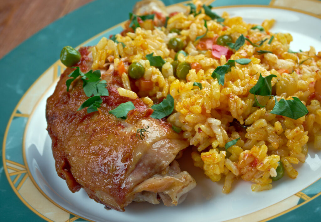 Galinhada served on a white plate, one of the best rice dishes