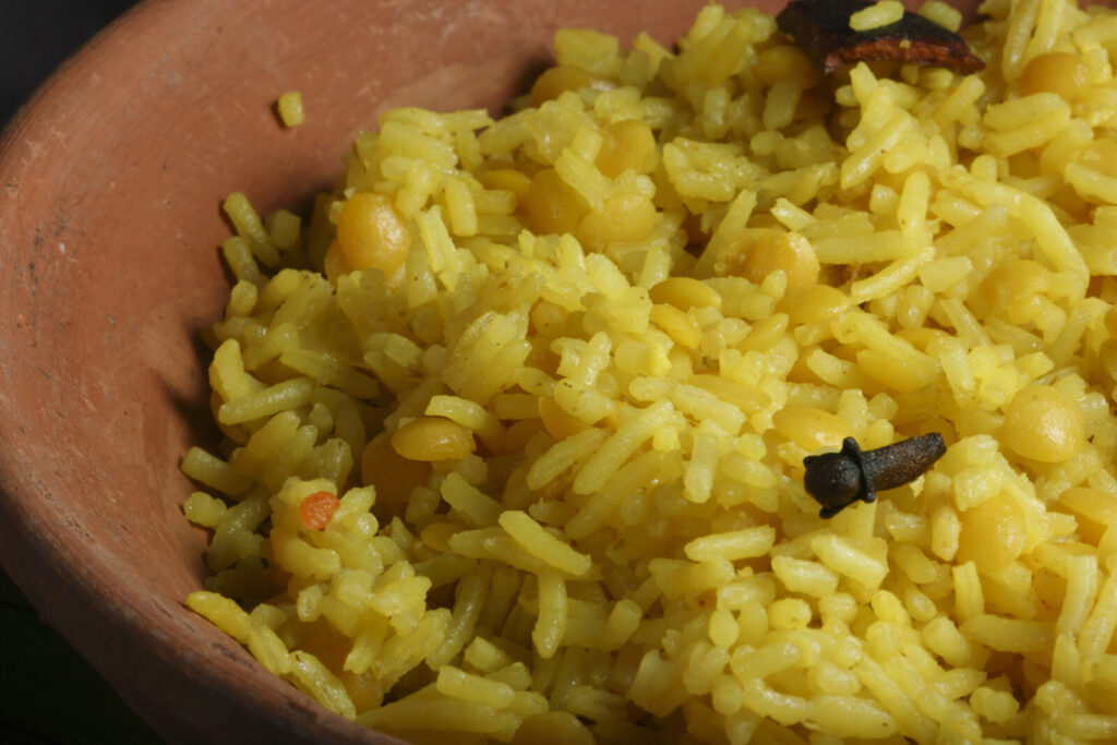 a clay dish with Khichdi, one of the best rice dishes