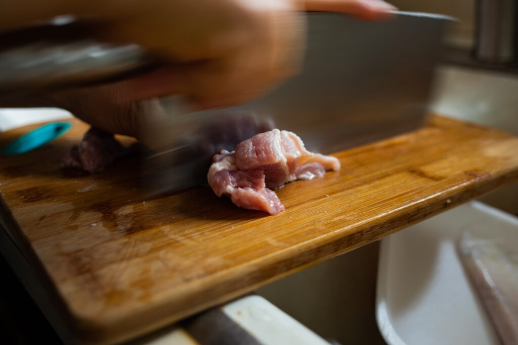 chopping raw meat