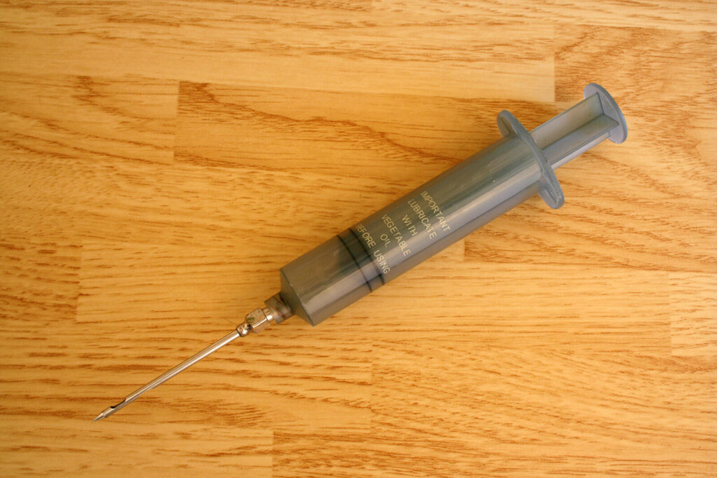 meat injector, one of the kitchen tools in the list