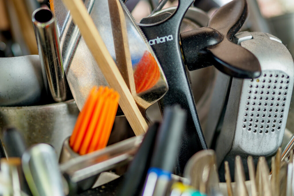 an image of kitchen utensils representing the article "New Year, New Kitchen: The Best Way To Organize Kitchen" by My Kitchendom