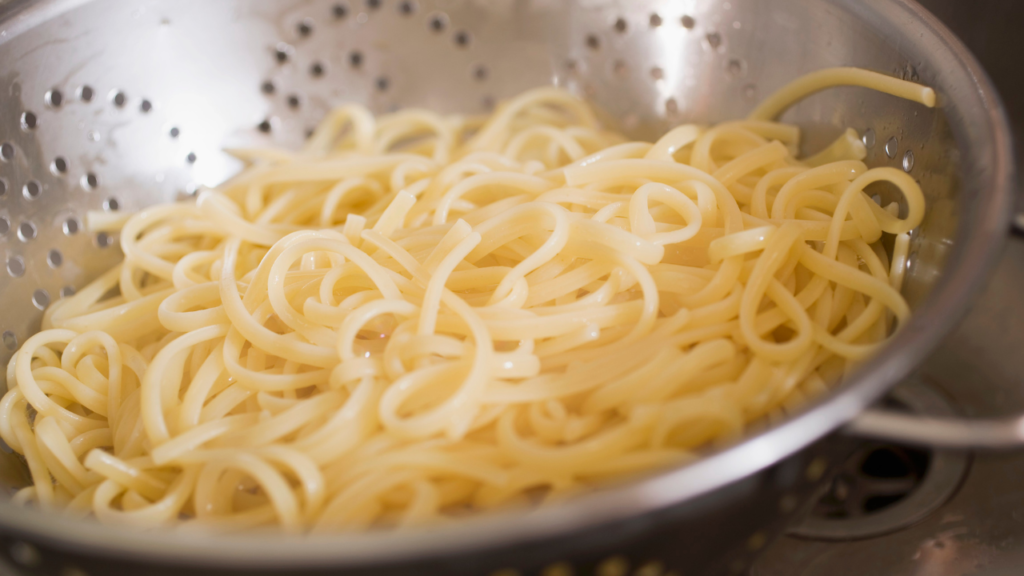 pasta draining in a colander