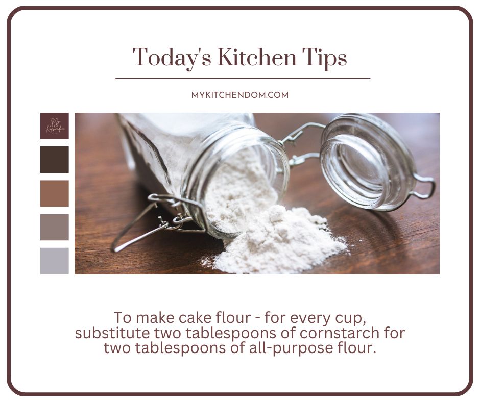 a mason jar of white flour on its side with some of the contents spilled on the wooden surface